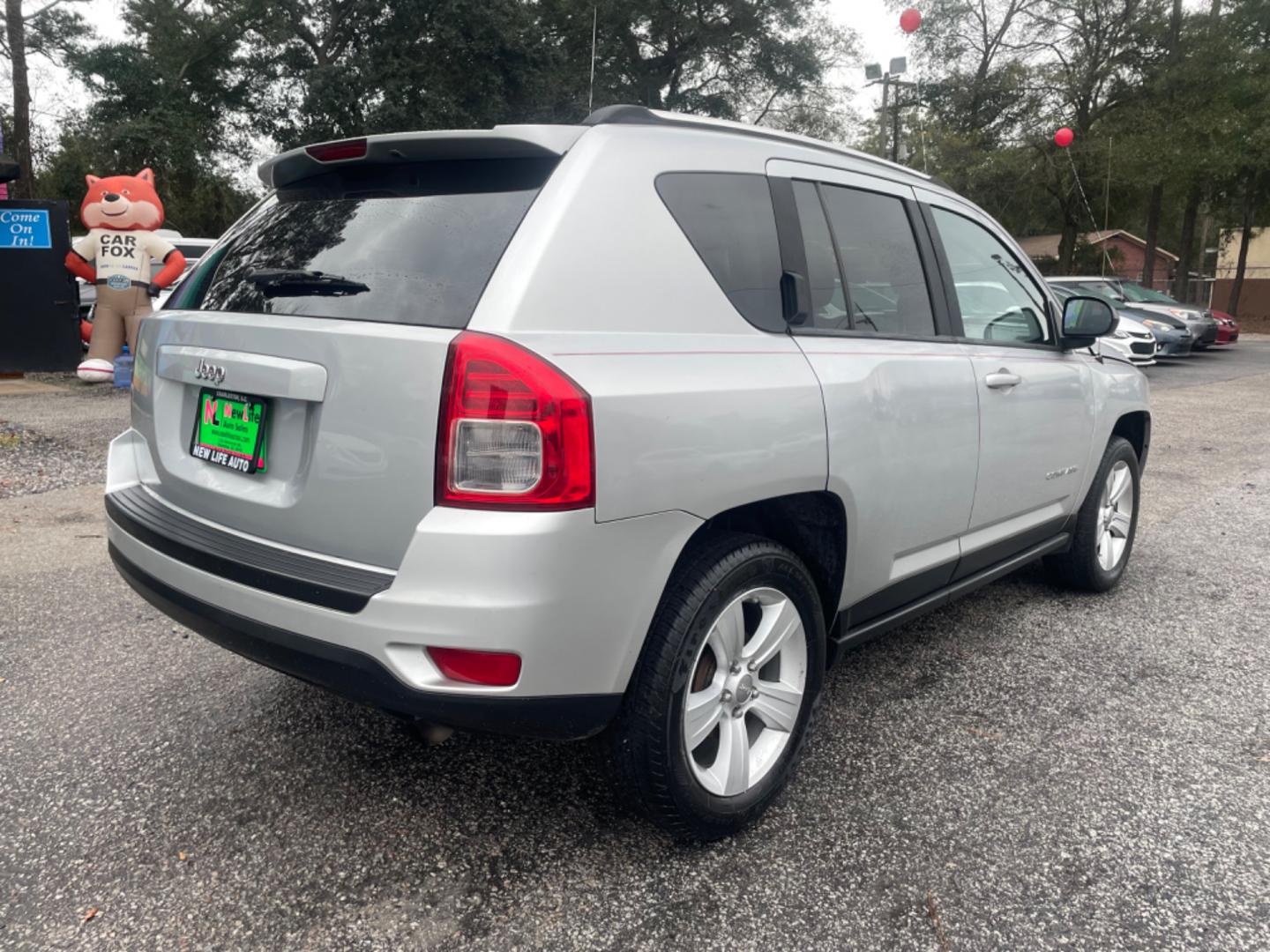 2012 SILVER JEEP COMPASS SPORT (1C4NJCBA8CD) with an 2.0L engine, Continuously Variable transmission, located at 5103 Dorchester Rd., Charleston, SC, 29418-5607, (843) 767-1122, 36.245171, -115.228050 - Spacious Interior with CD/AUX/AM/FM, Hands-free Phone, Power Windows, Power Locks, Power Windows, Power Mirrors, Keyless Entry, Alloy Wheels. Local Trade-in!! 108k miles Located at New Life Auto Sales! 2023 WINNER for Post & Courier's Charleston's Choice Pre-owned Car Dealer AND 2018-2024 Top 5 Fin - Photo#6